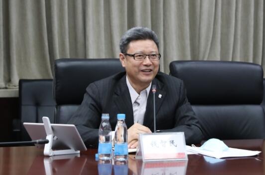 錢智民拜訪中國建材黨委書記、董事長周育先